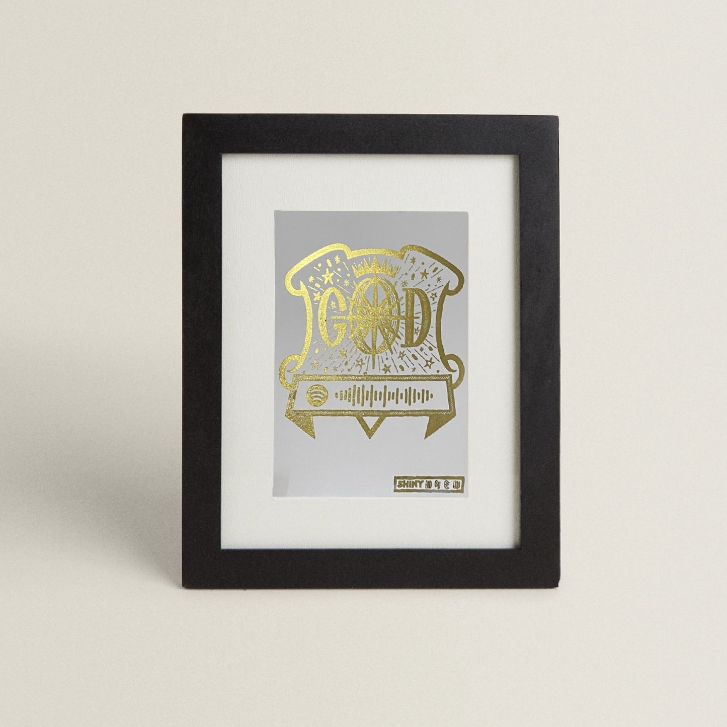 A5 size foil print of Track12 Sticker Design